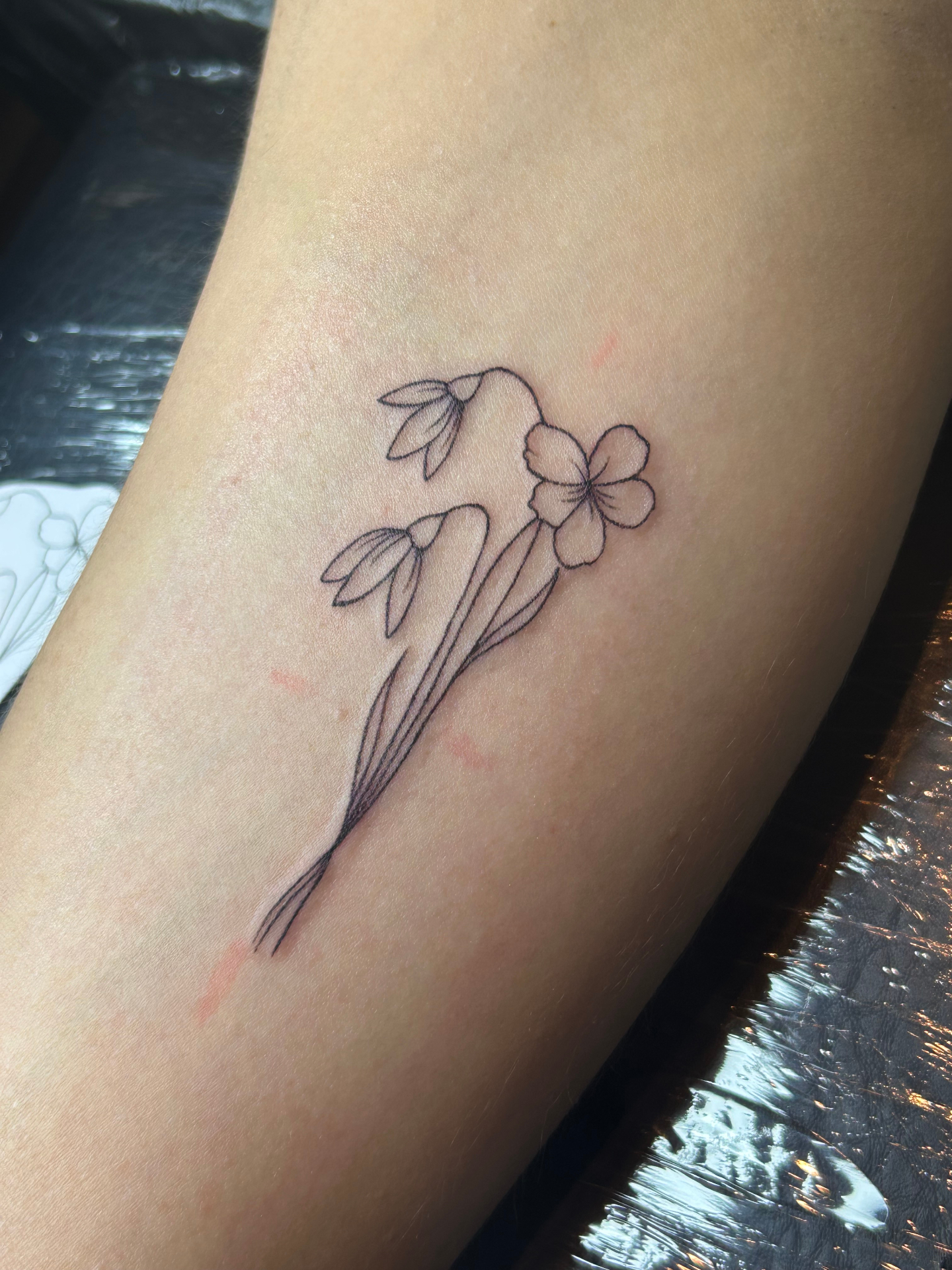 Bloemen fineline tattoo